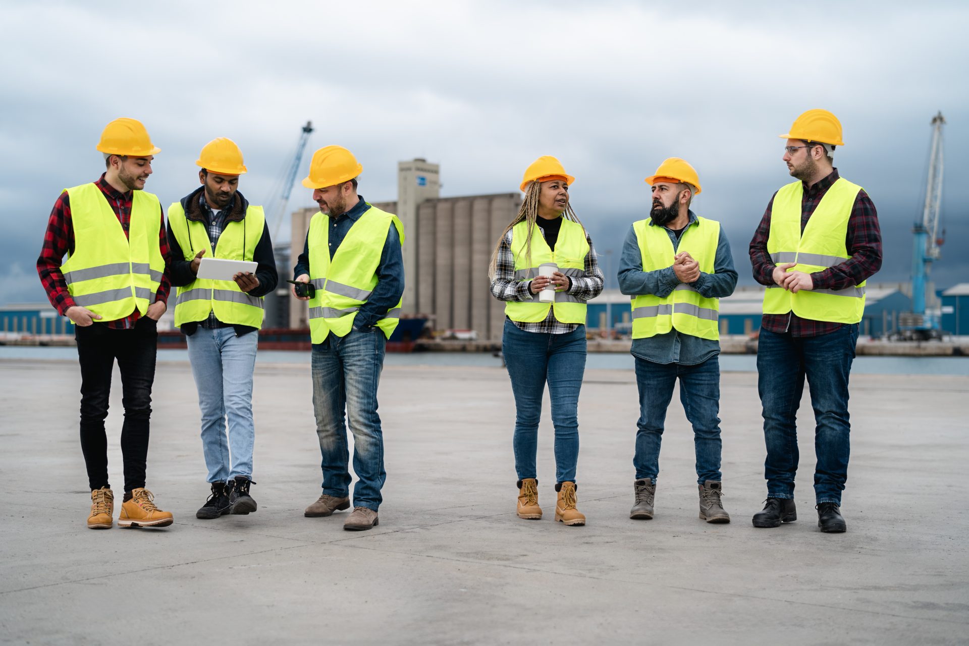 Construction site supervisors reviewing work on site